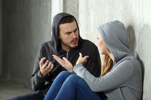 Couple of teenagers arguing sitting on the floor in a dark place - Taurus Man And Cancer Woman Breakup